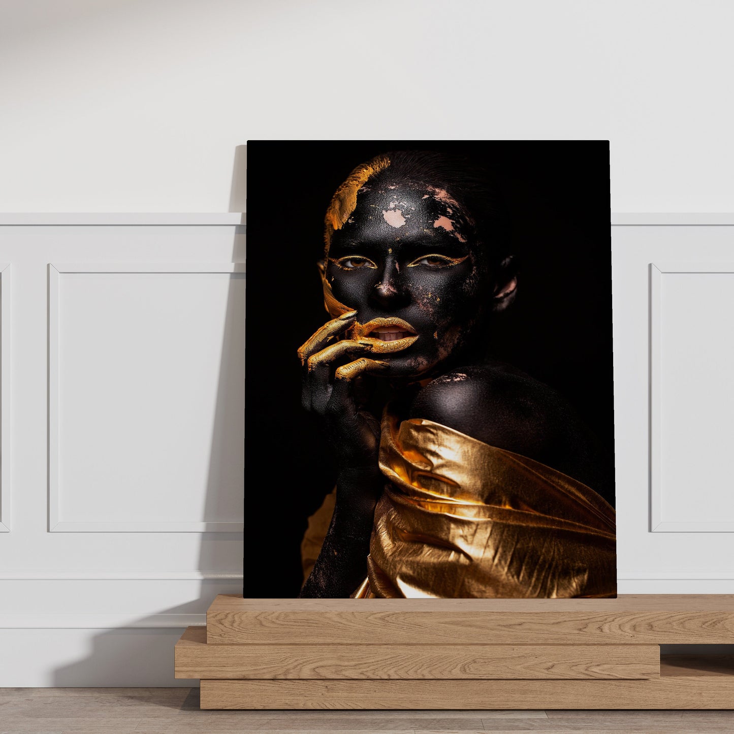 a painting of a woman in black and gold