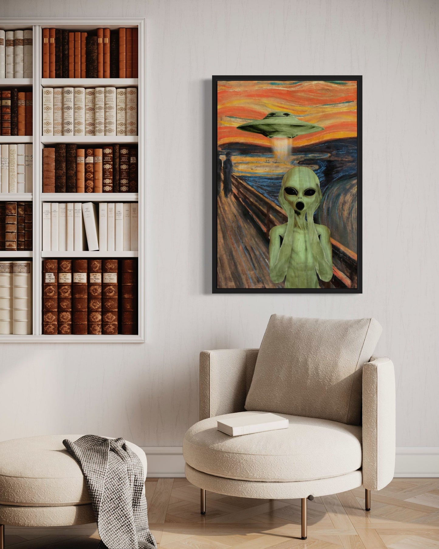 a living room with a chair and a painting on the wall