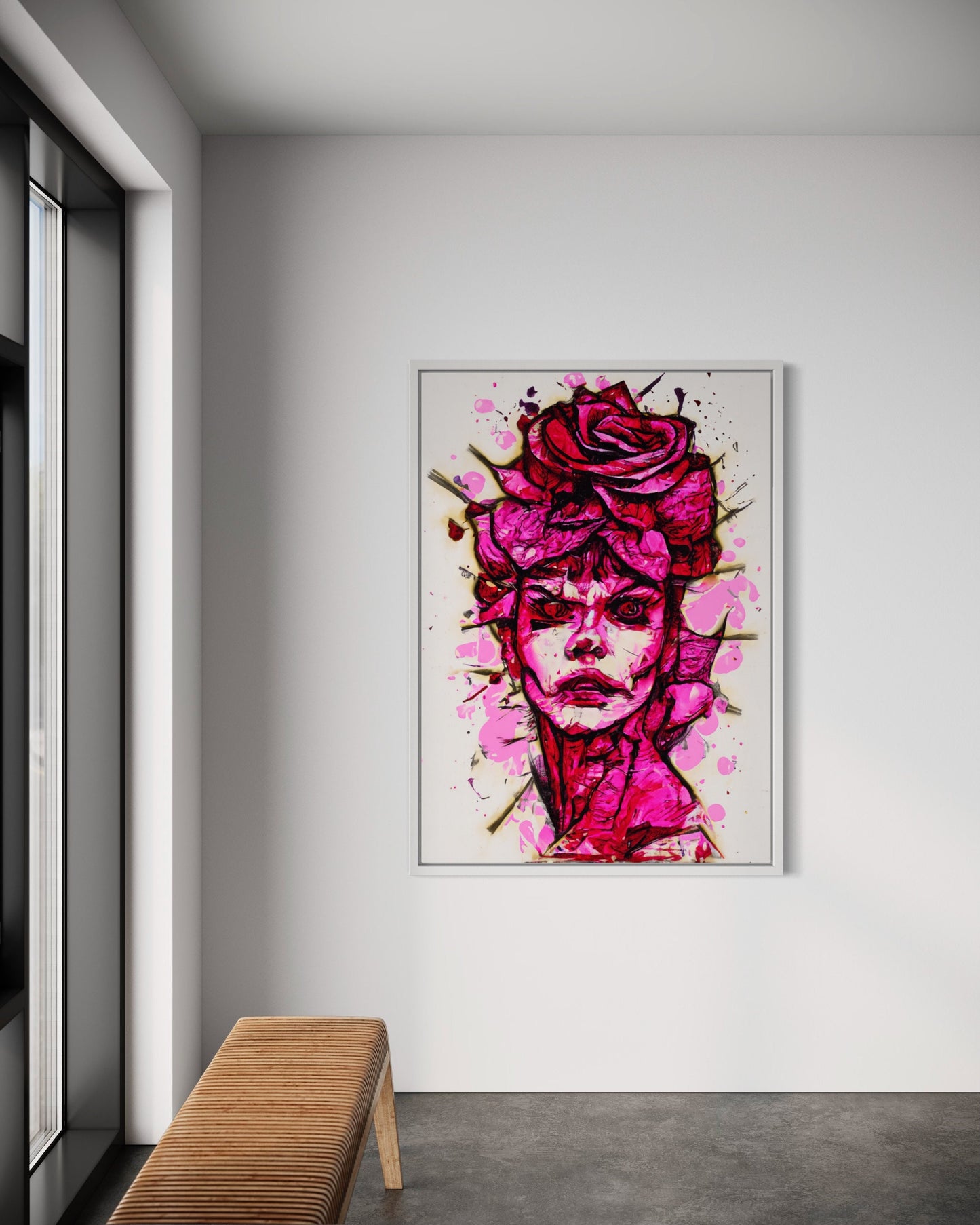 a painting of a woman's face on a white wall