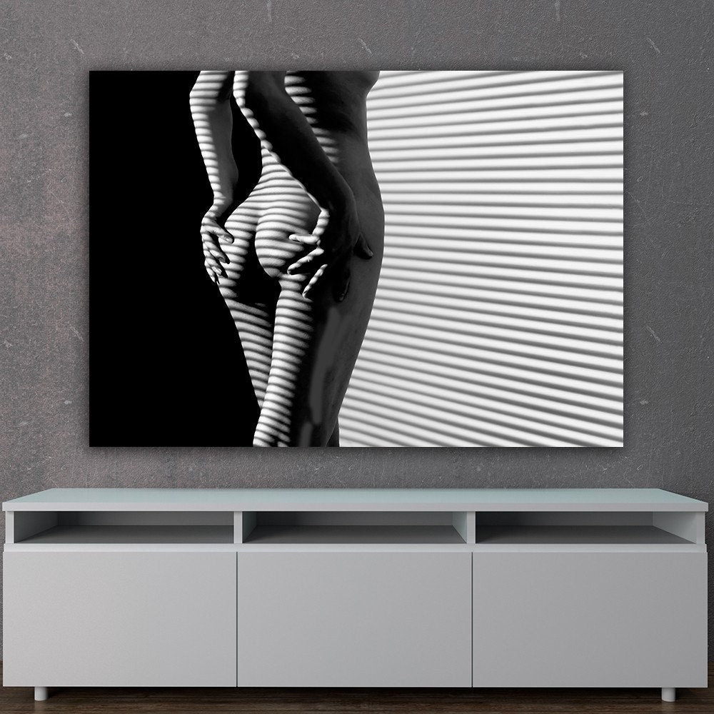 a black and white photo of a woman's butt