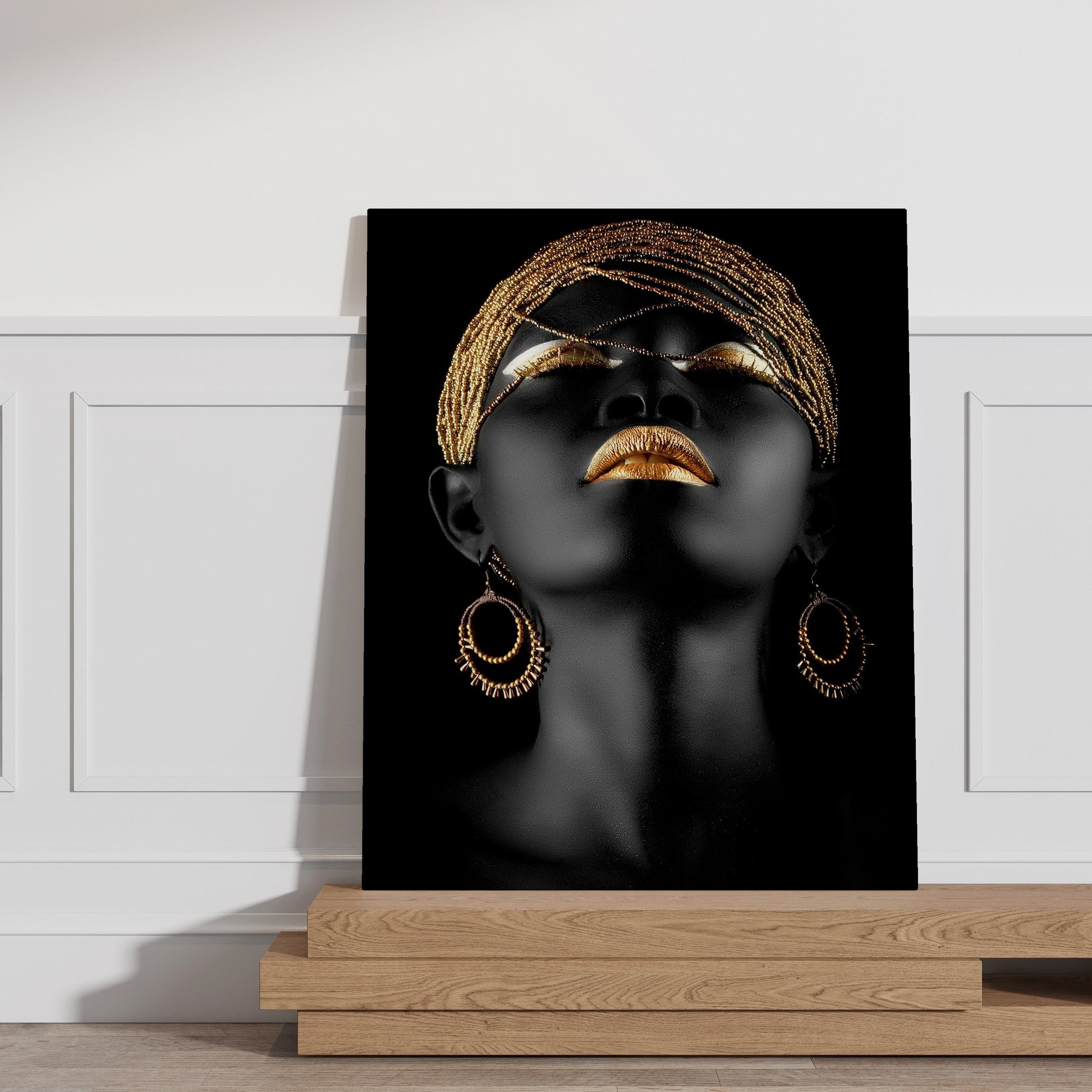 a painting of a woman&#39;s face with gold jewelry