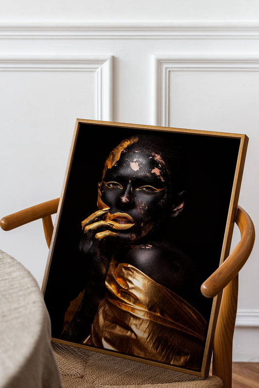 a chair with a picture of a woman painted on it