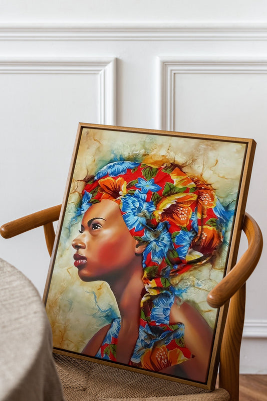 a painting of a woman&#39;s face on a chair