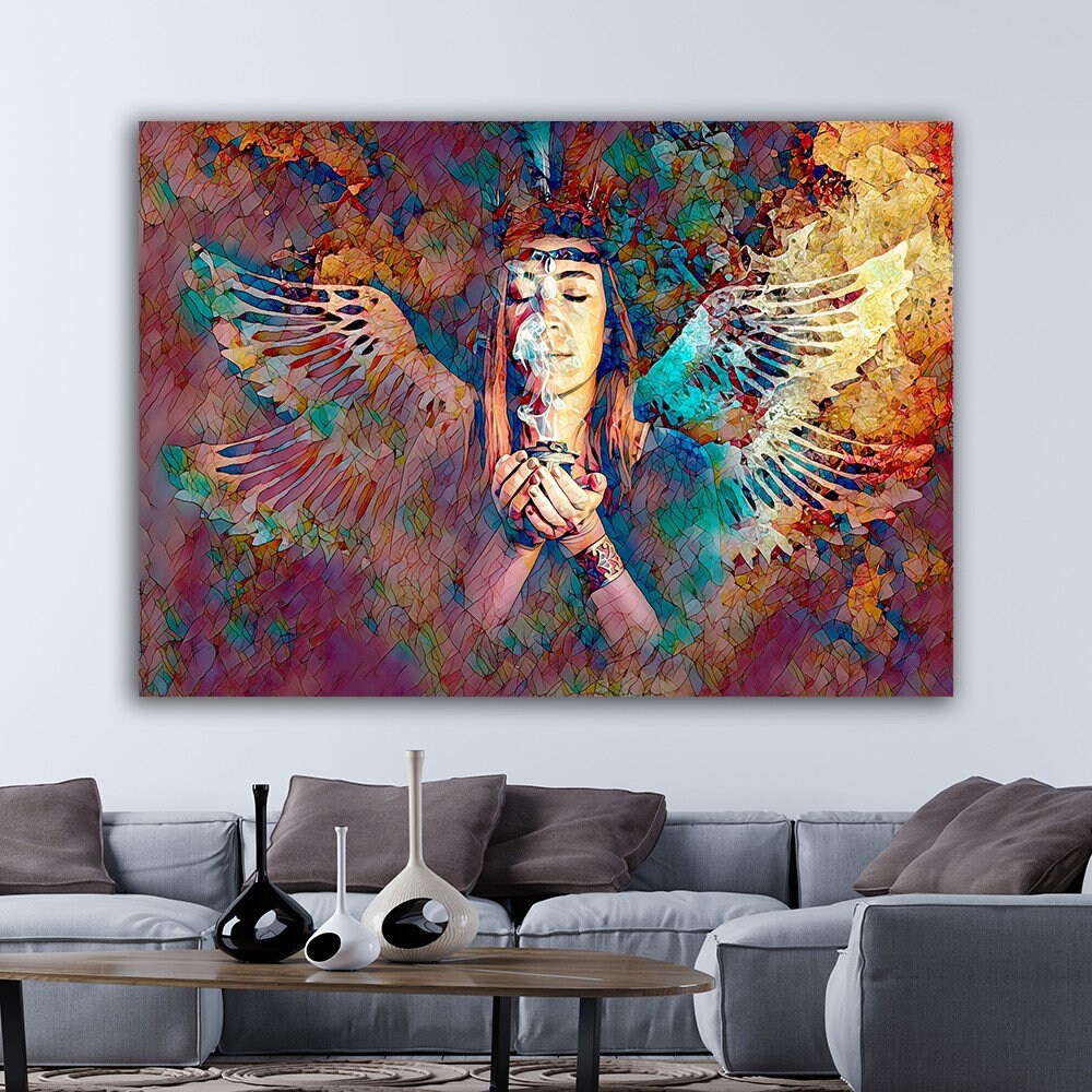 a living room with a couch and a painting on the wall