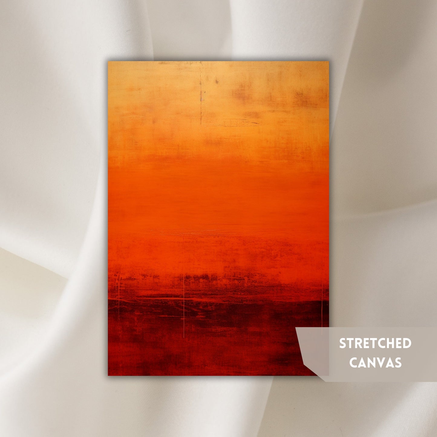 an orange and red painting on a white wall